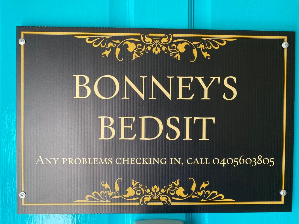 Bonney's Bedsit is marked with a lovely sign
