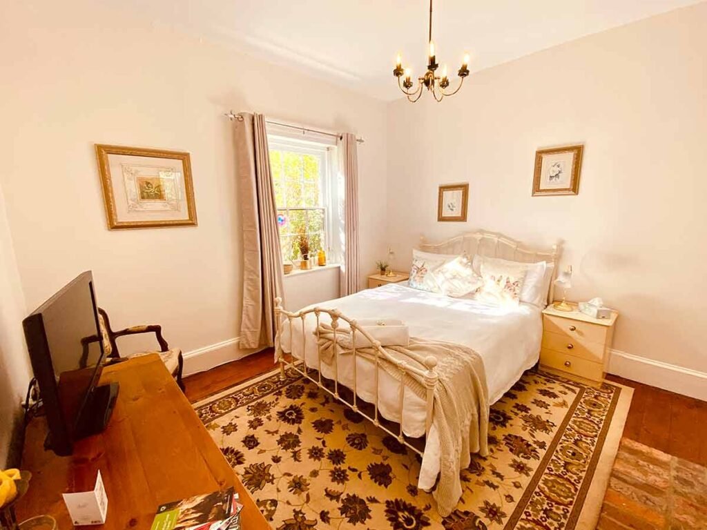 Relax in bed and watch TV on the flatscreen TV