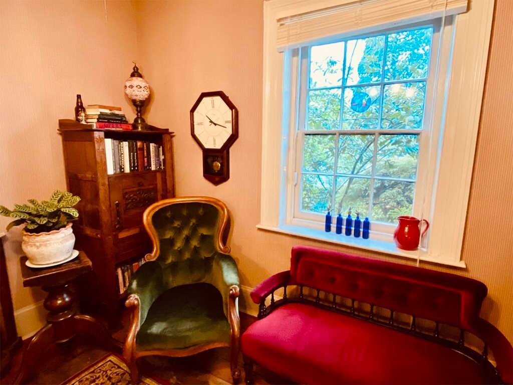 A comfortable chair awaits you in Bonneys Inn guest lounge